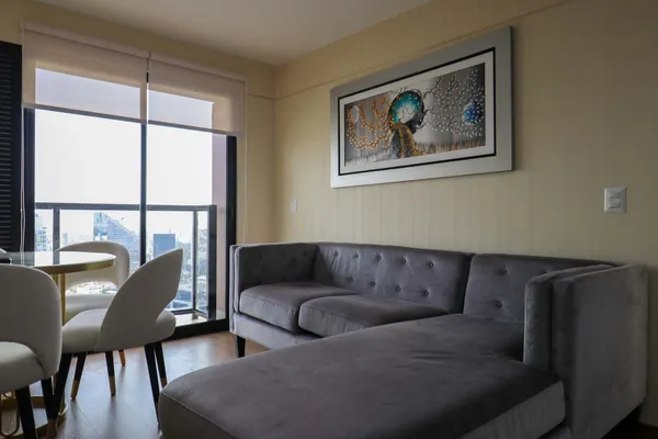 Elegant 2BR Haven w/ Private Balcony & Panoramic City Views