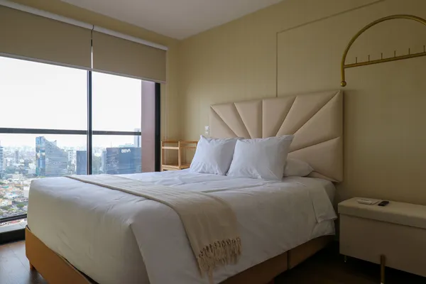 Elegant 2BR Haven w/ Private Balcony & Panoramic City Views